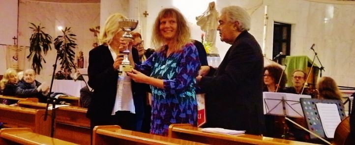 Fiona receiving the cup